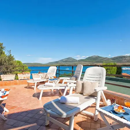 Clicksardegna Flavia With Seafront Terrace In The Porto Conte Nature Park Feriehus